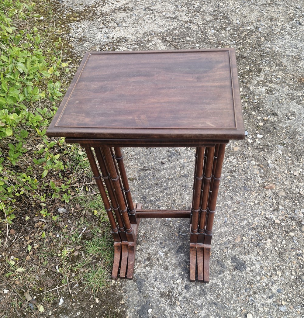 Nest of 3 Regency mahogany occasional tables.  View VII