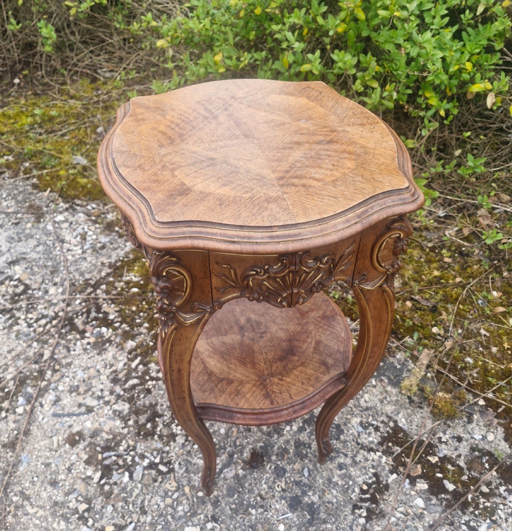 Late 19th century walnut and gilt heightened 2 tier table.  View II
