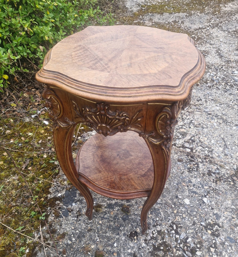 Late 19th century walnut and gilt heightened 2 tier table.  View VI