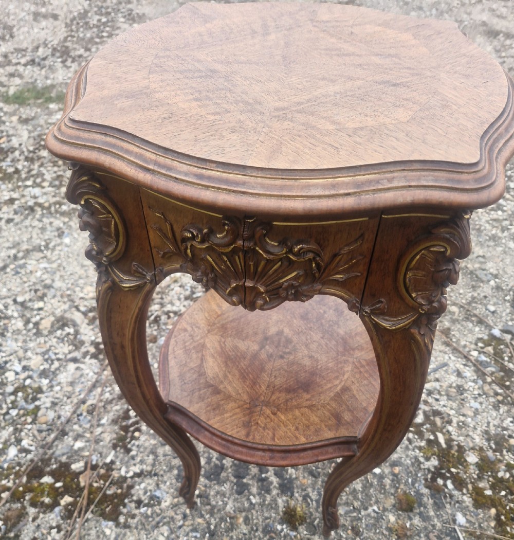 Late 19th century walnut and gilt heightened 2 tier table.  View VII