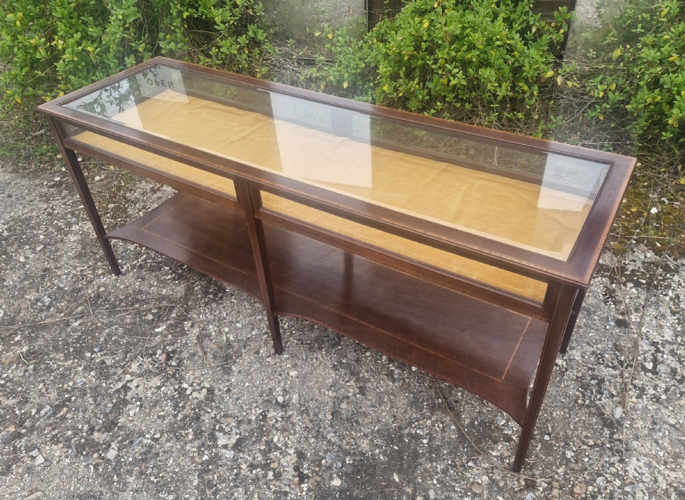 Inlaid mahogany double bijouterie display table.