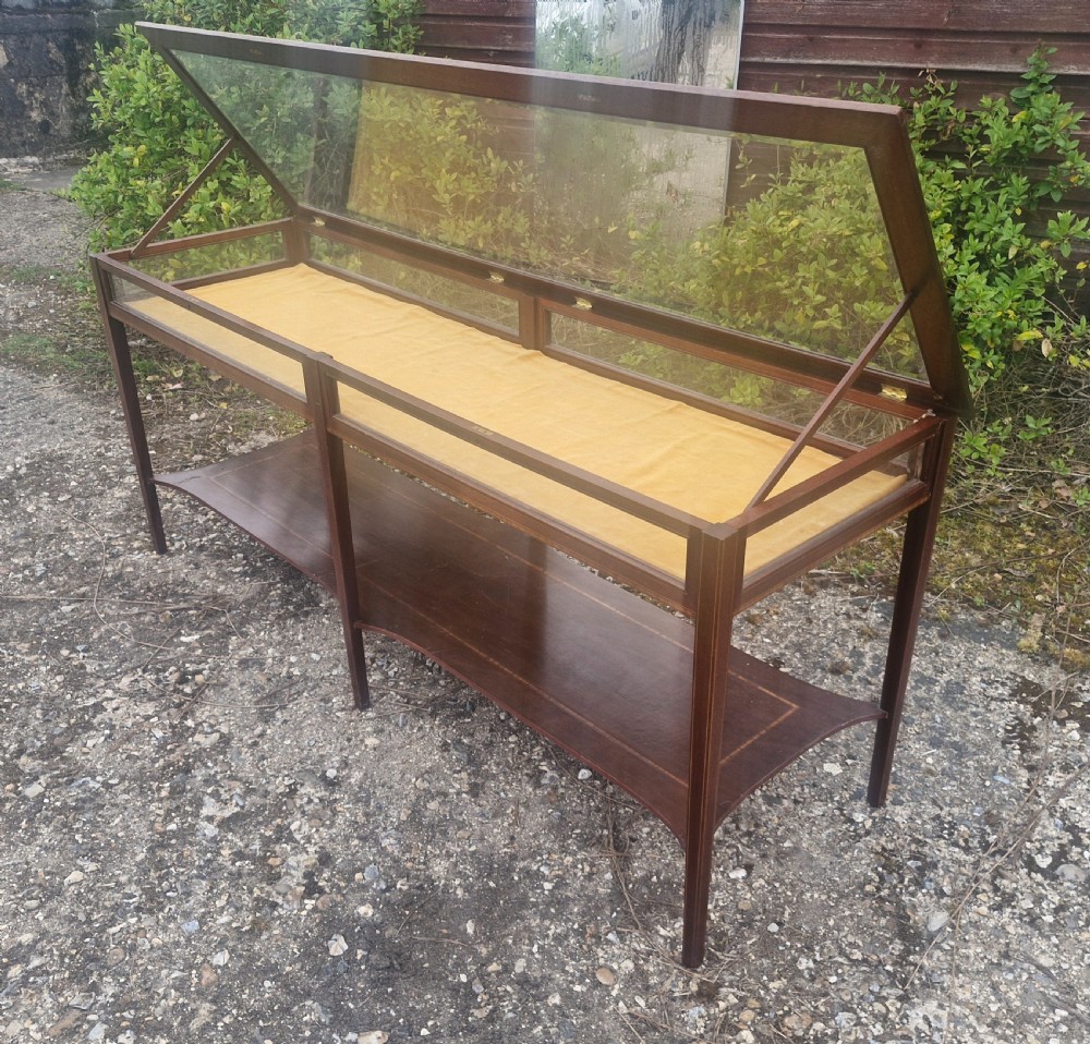 Inlaid mahogany double bijouterie display table. View II