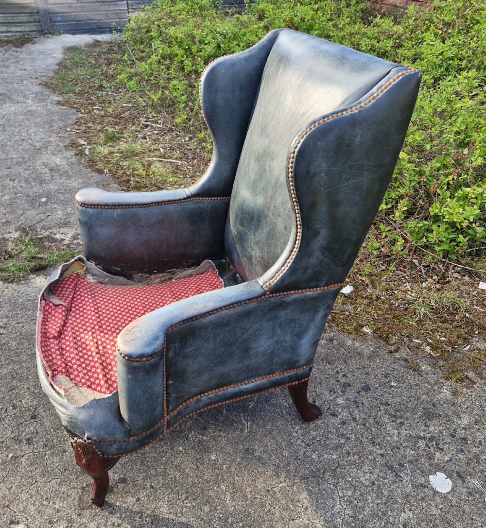 Upholstered wing back armchair.  View VI