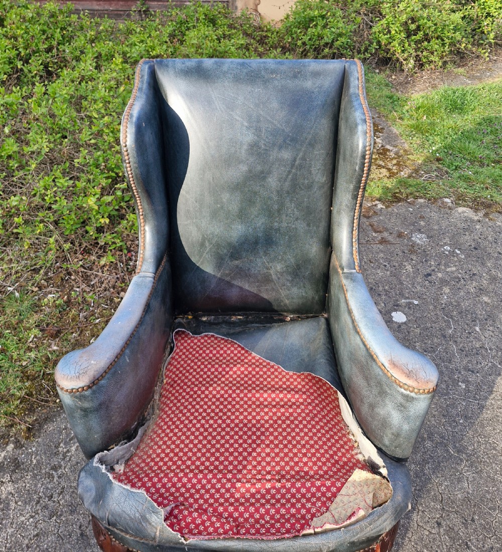Upholstered wing back armchair.  View VIII