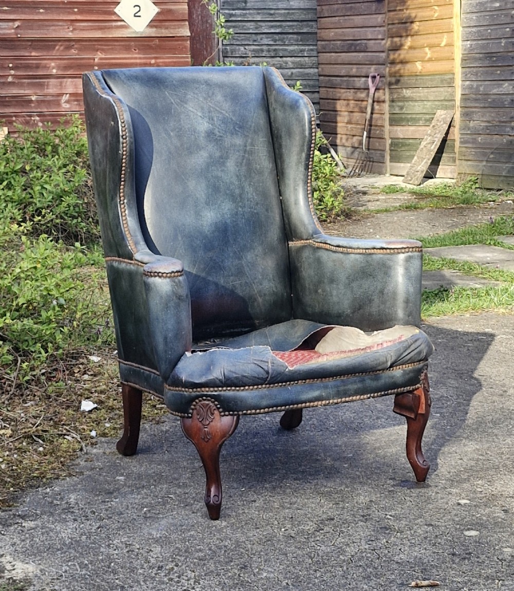 Upholstered wing back armchair.  View XIII