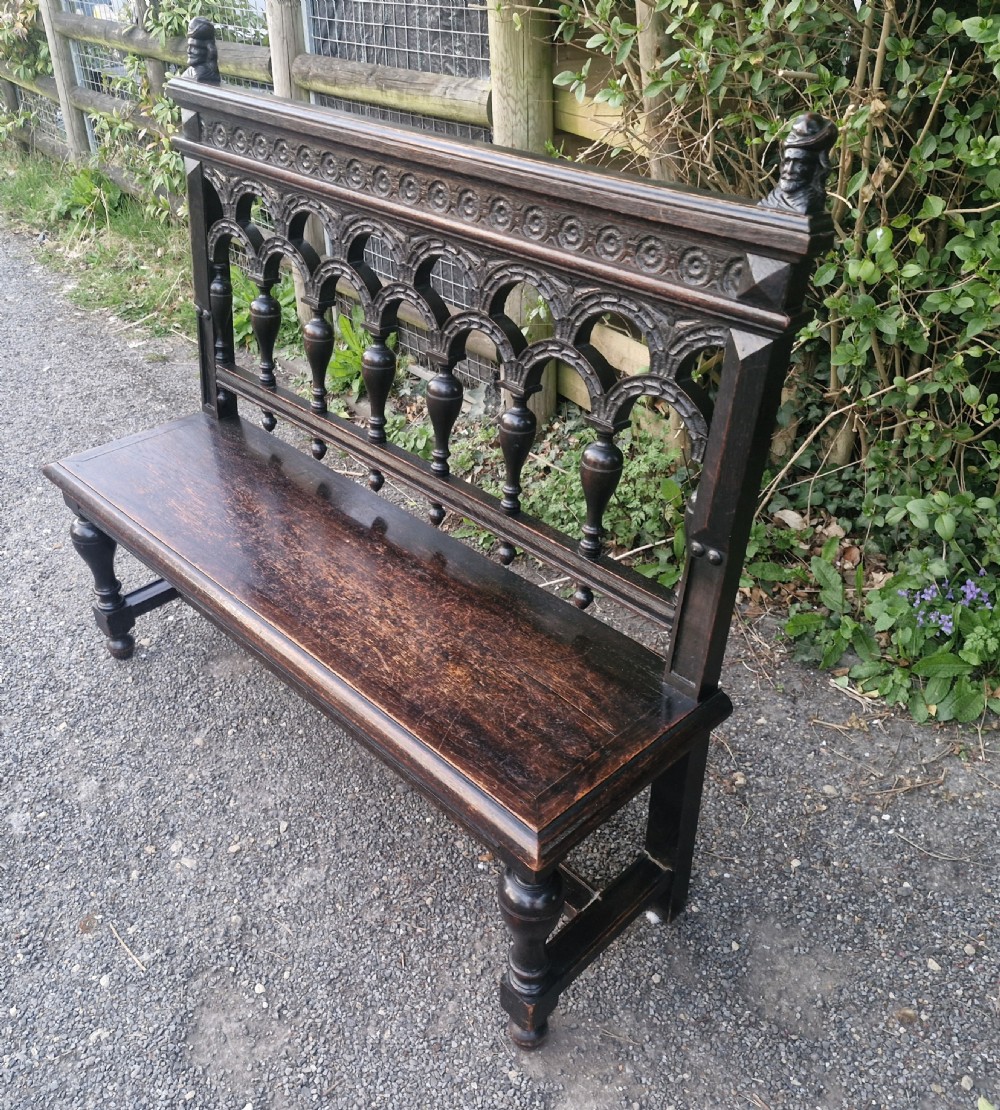Victorian carved oak hall bench.  View VI