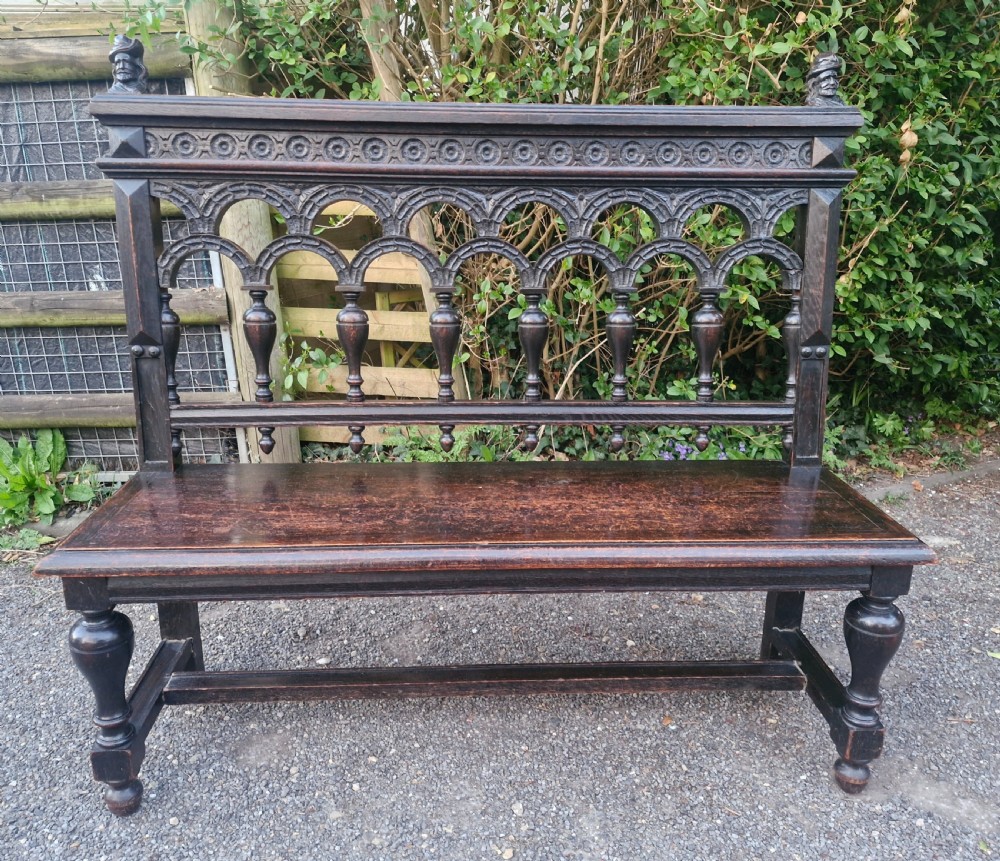 Victorian carved oak hall bench.  View IX
