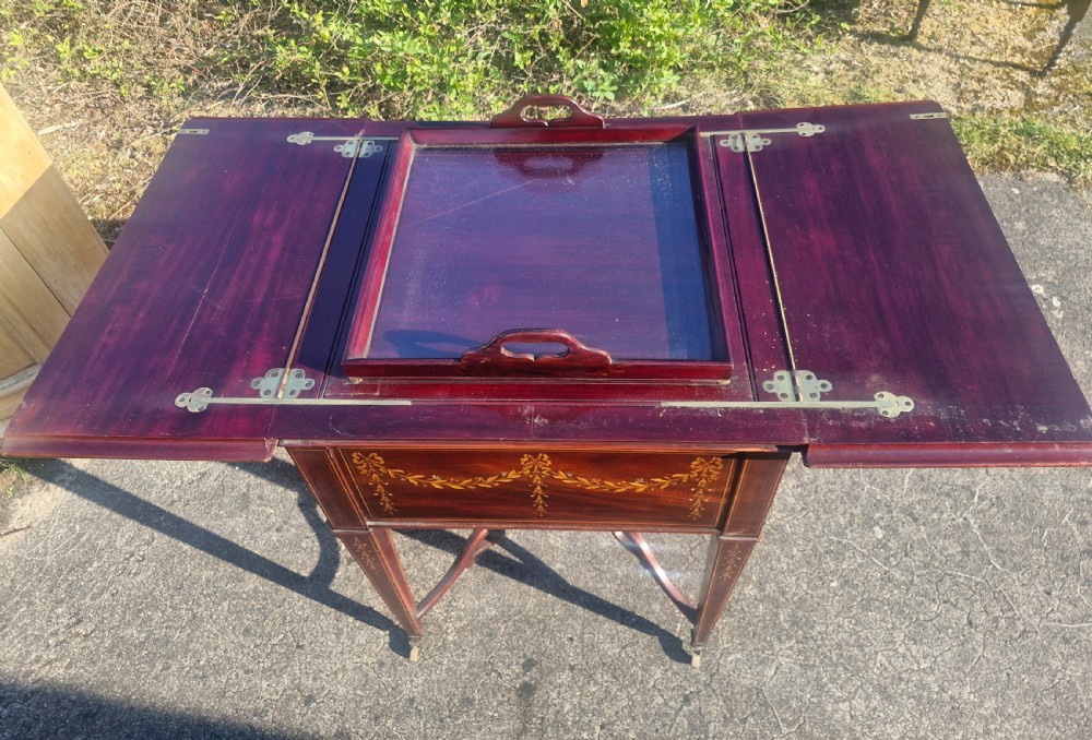 Edwardian inlaid mahogany surprise drinks table. View XI