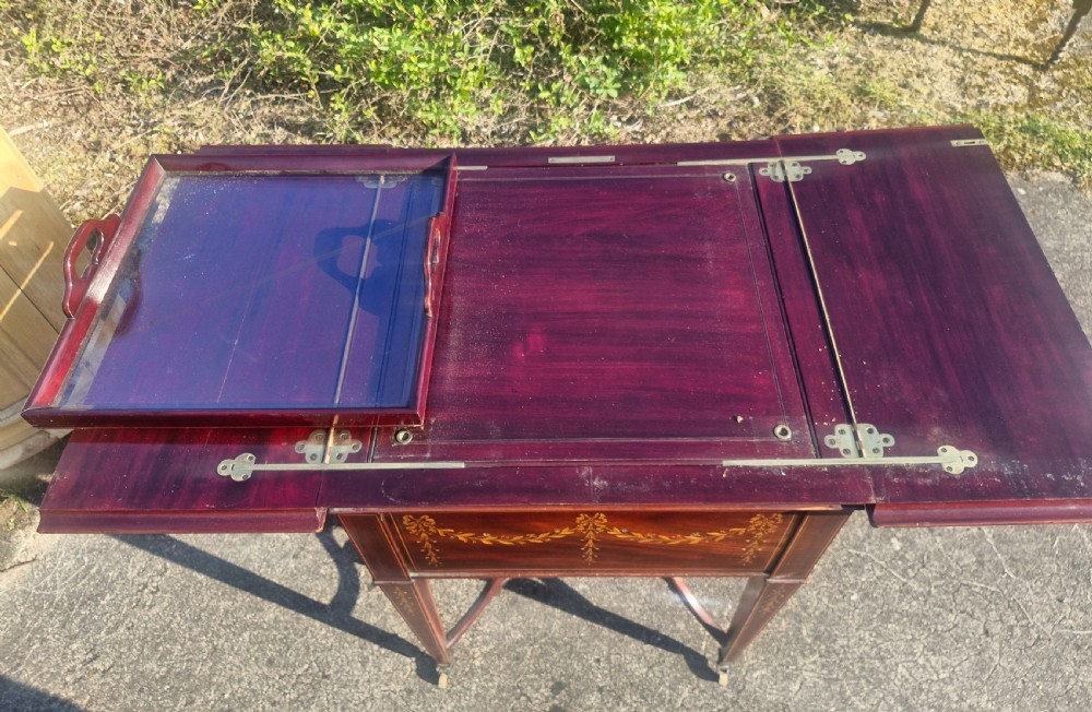 Edwardian inlaid mahogany surprise drinks table. View XII
