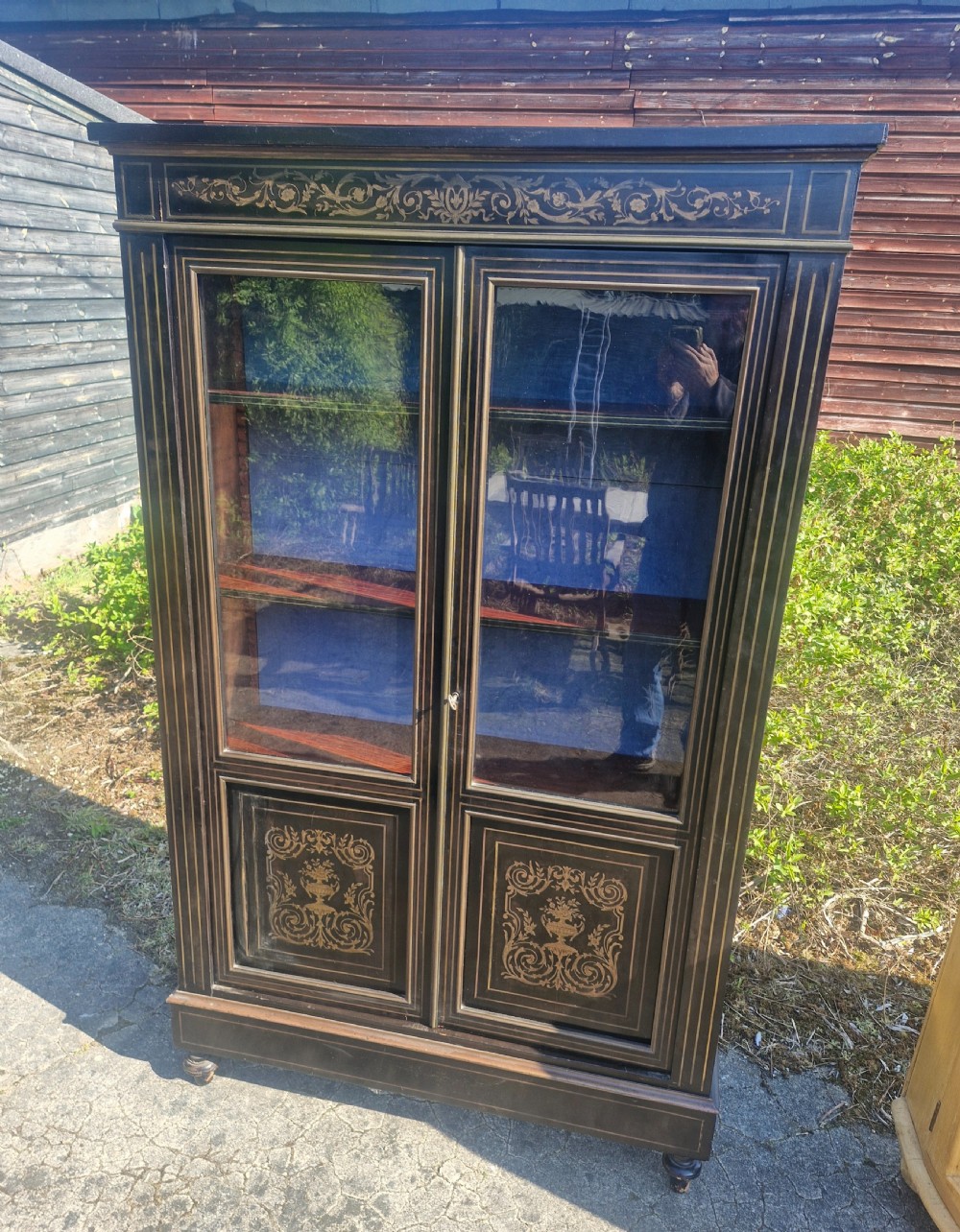 Late 19th century brass inlaid cabinet.  View VI
