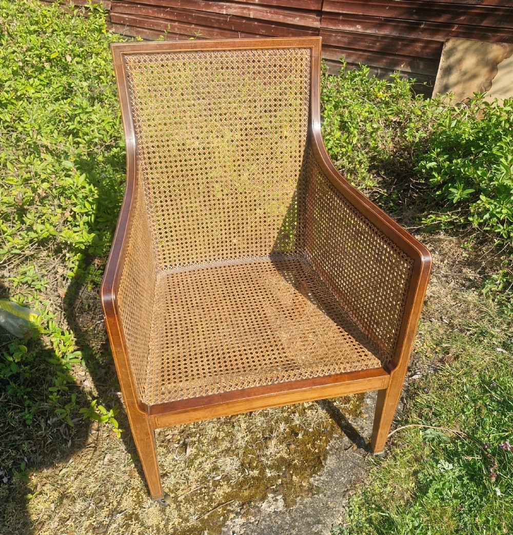 Edwardian inlaid mahogany bergere armchair.  View II