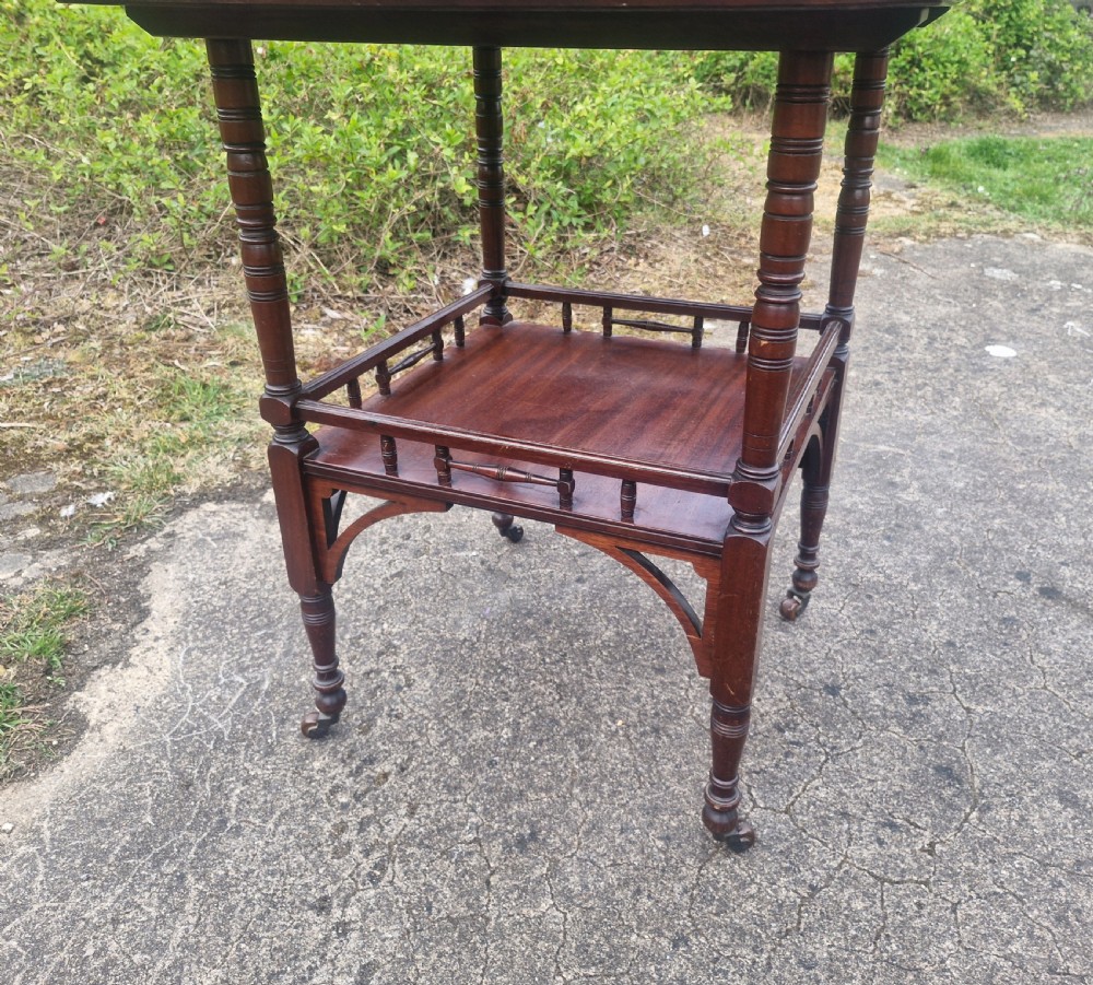 Late Victorian mahogany 2 tier table of Aesthetic design. View VI