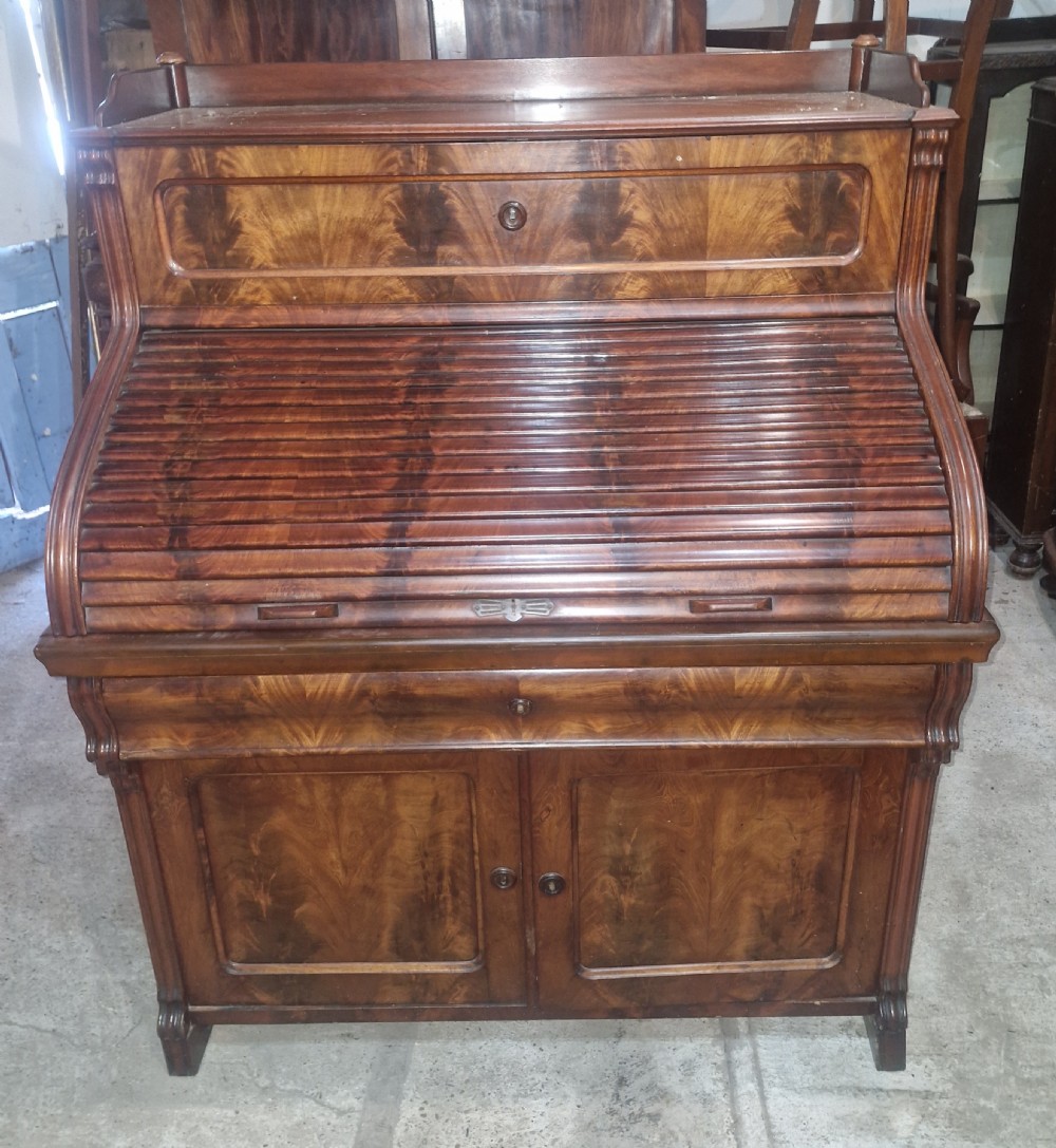 Late 19th century mahogany tambour front writing desk. View XII