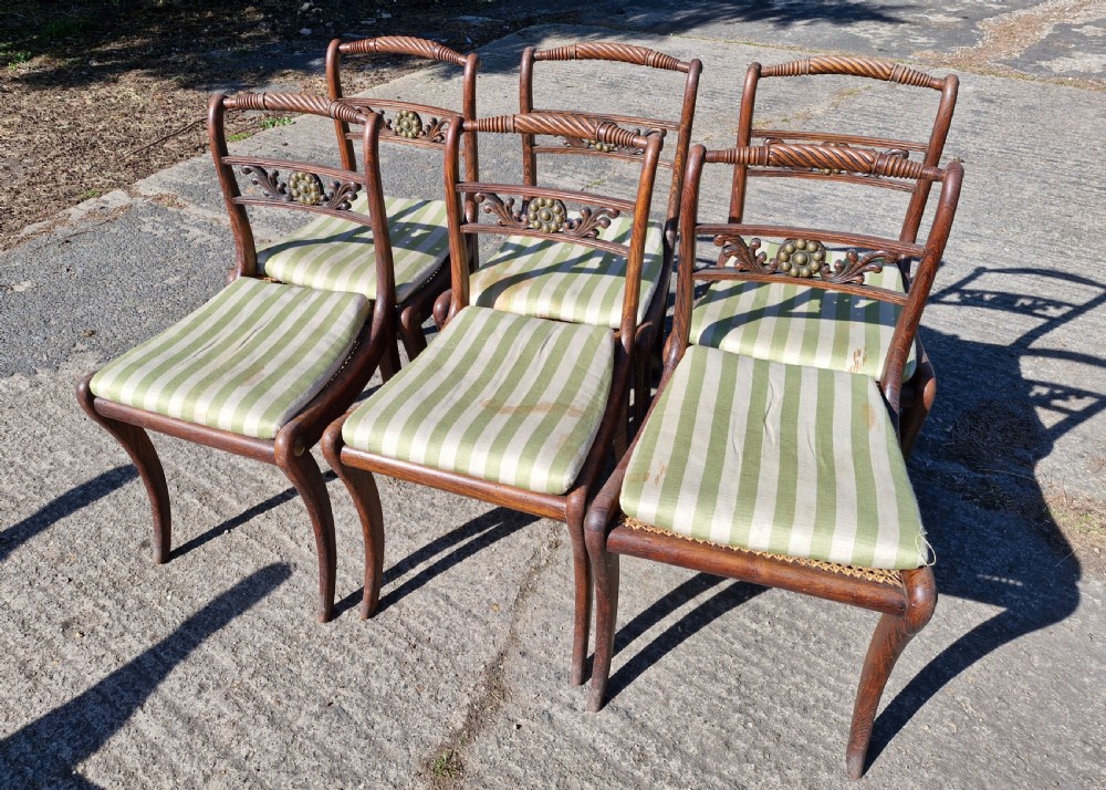 Set of 6 simulated rosewood dining chairs with metal mounts and original squabs. View II