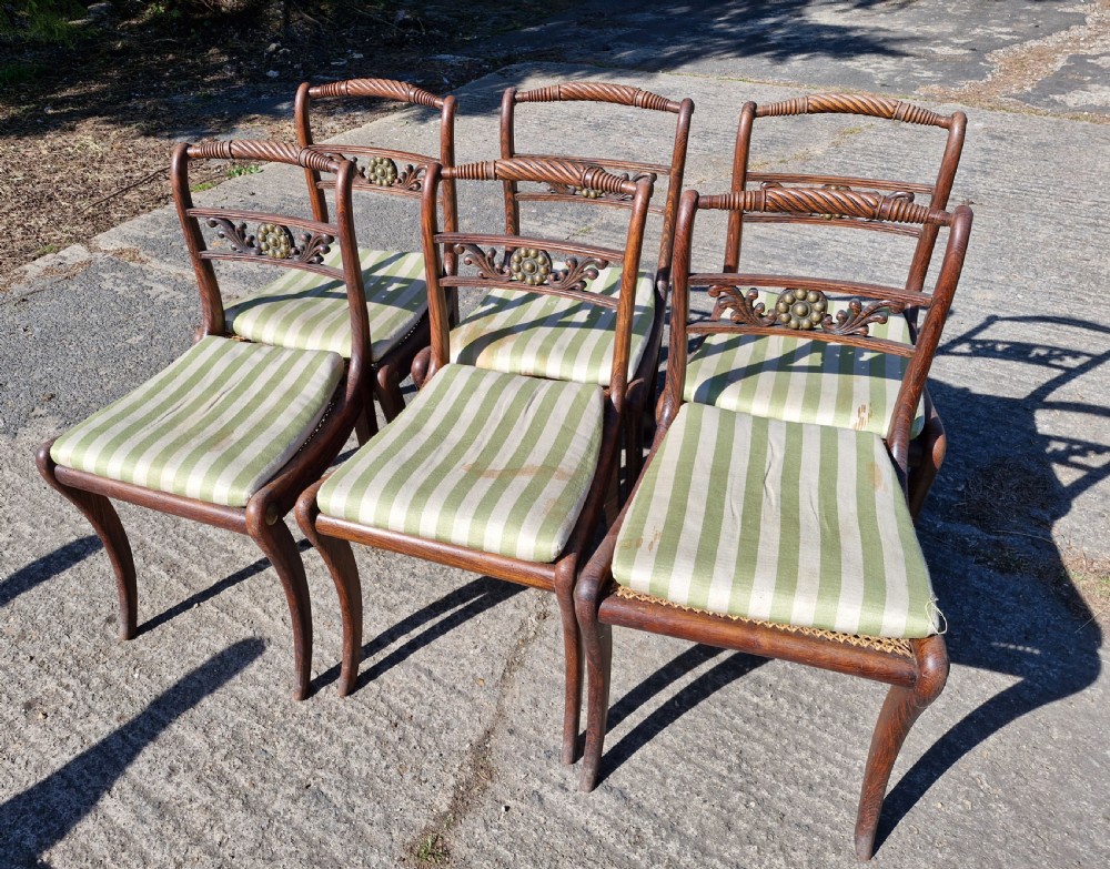 Set of 6 simulated rosewood dining chairs with metal mounts and original squabs. View VI