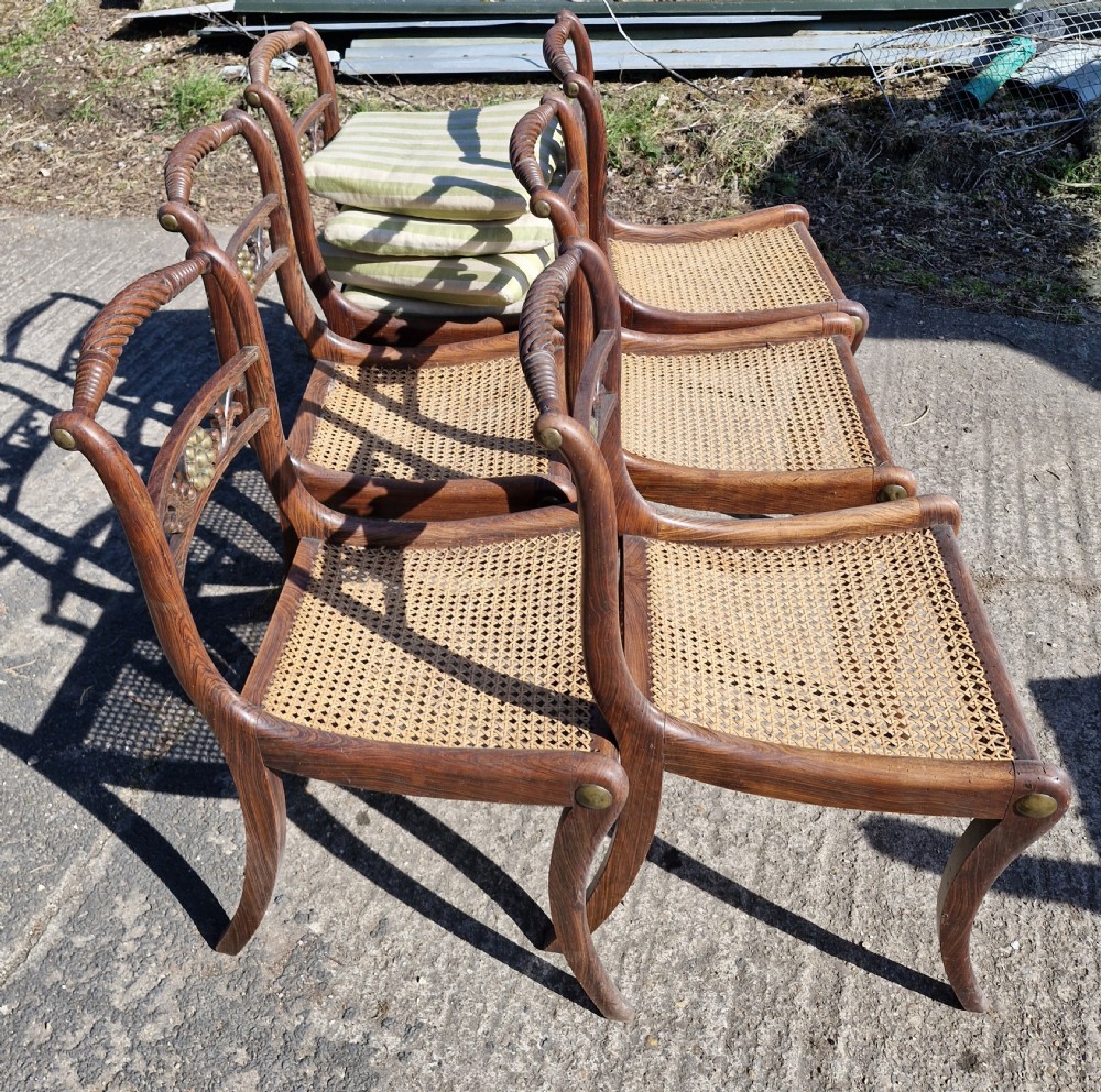 Set of 6 simulated rosewood dining chairs with metal mounts and original squabs. View VIII