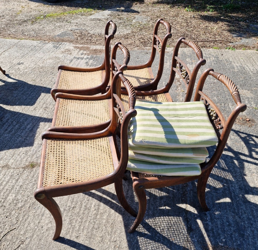 Set of 6 simulated rosewood dining chairs with metal mounts and original squabs. View IX