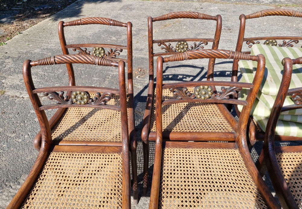 Set of 6 simulated rosewood dining chairs with metal mounts and original squabs. View XI