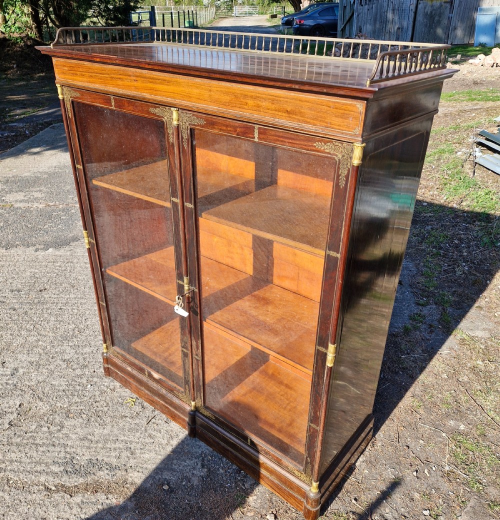19th century brass inlaid rosewood 2 door cabinet.  View XVIII