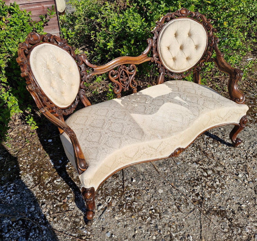 Victorian upholstered carved walnut conversation seat