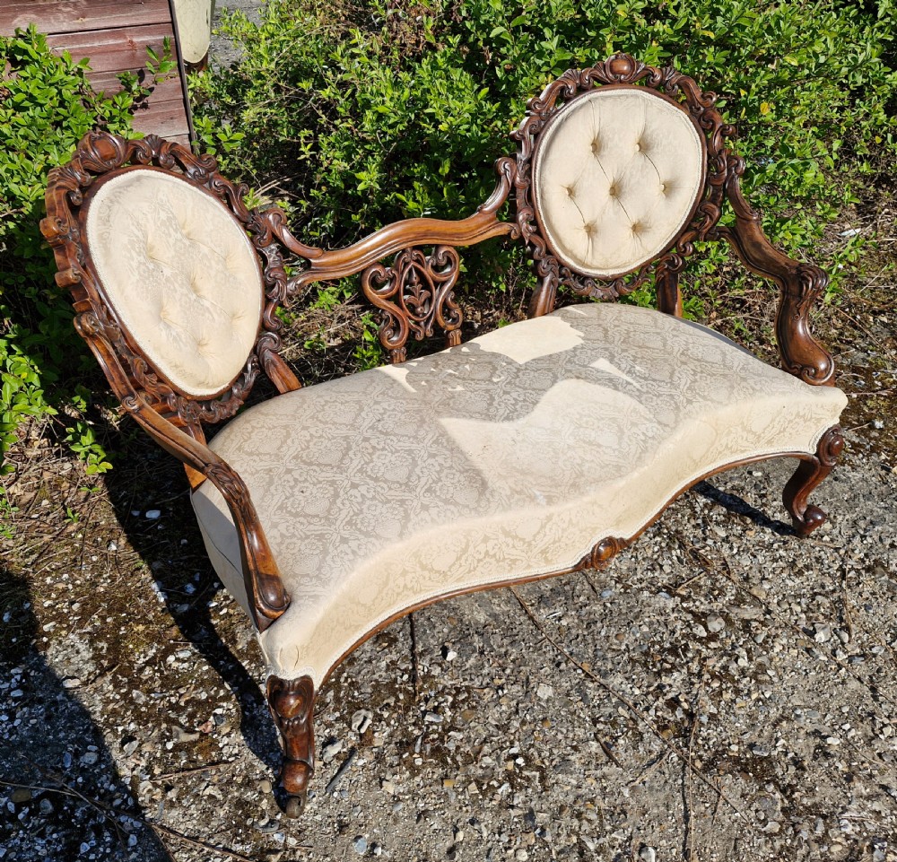 Victorian upholstered carved walnut conversation seat View II
