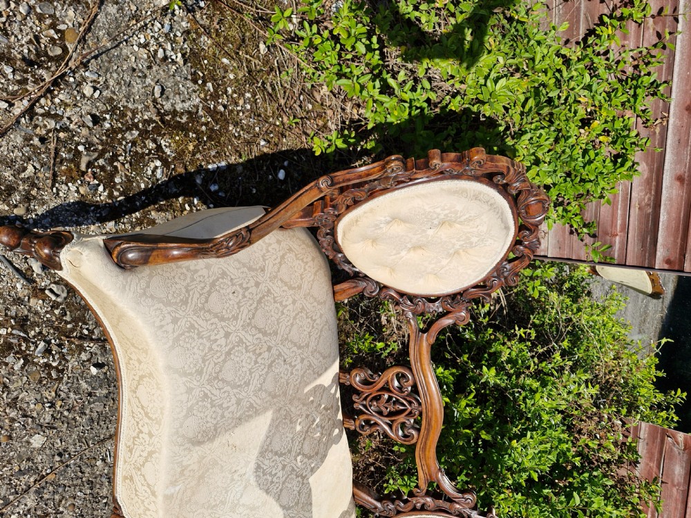 Victorian upholstered carved walnut conversation seat View IV