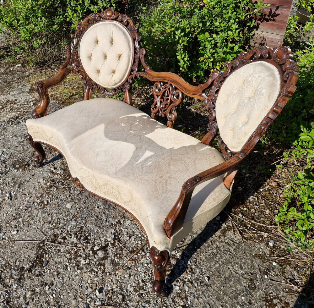 Victorian upholstered carved walnut conversation seat View V