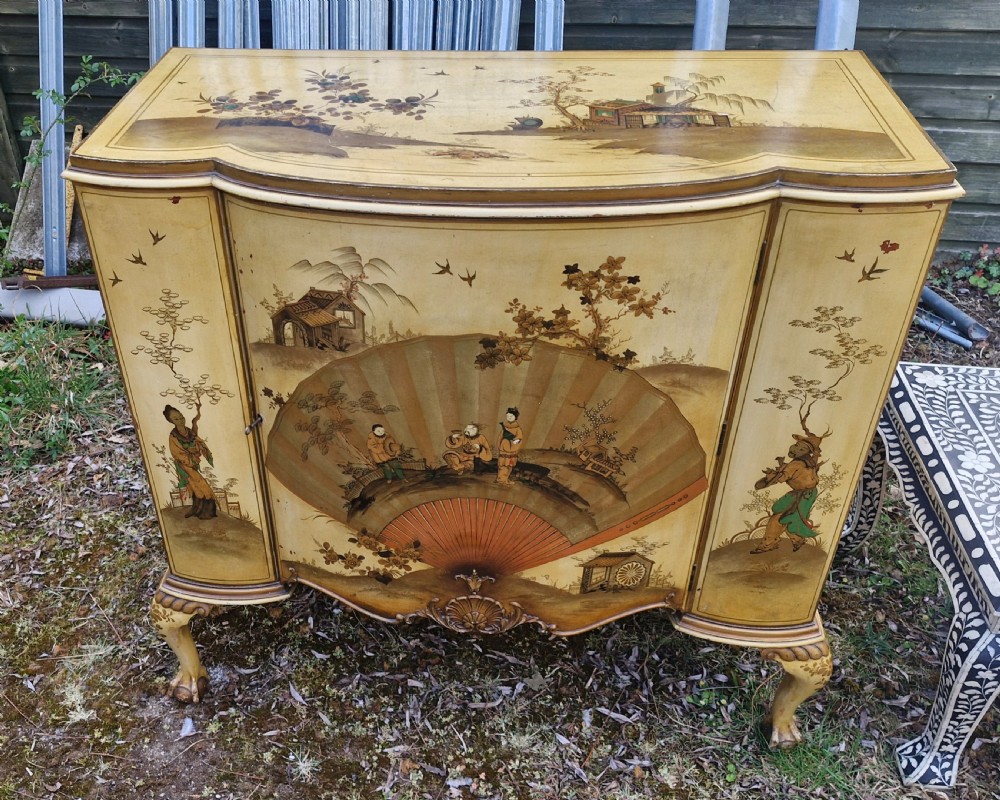 Good lacquered side cabinet.  View III