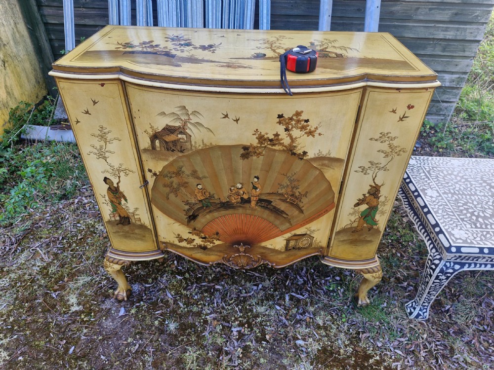 Good lacquered side cabinet.  View VII