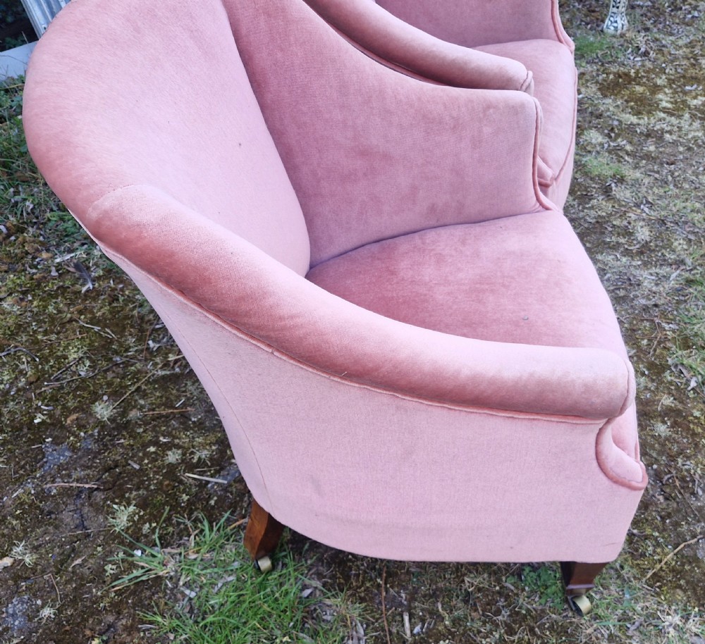 Pair of Edwardian mahogany upholstered armchairs with maker's stamp.  View III
