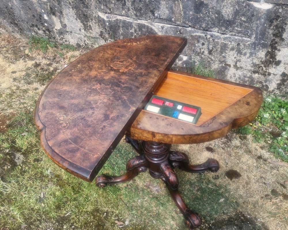 Victorian inlaid burr walnut games table.  View VI