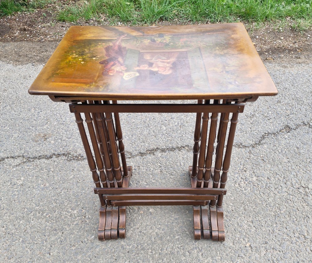 Nest of 4 early 20th century decorated occasional tables. View II