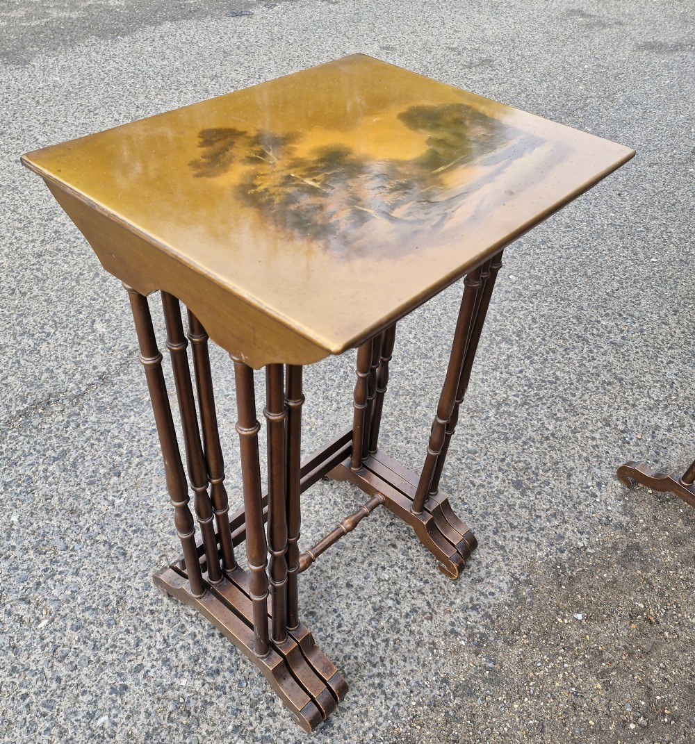 Nest of 4 early 20th century decorated occasional tables. View IV