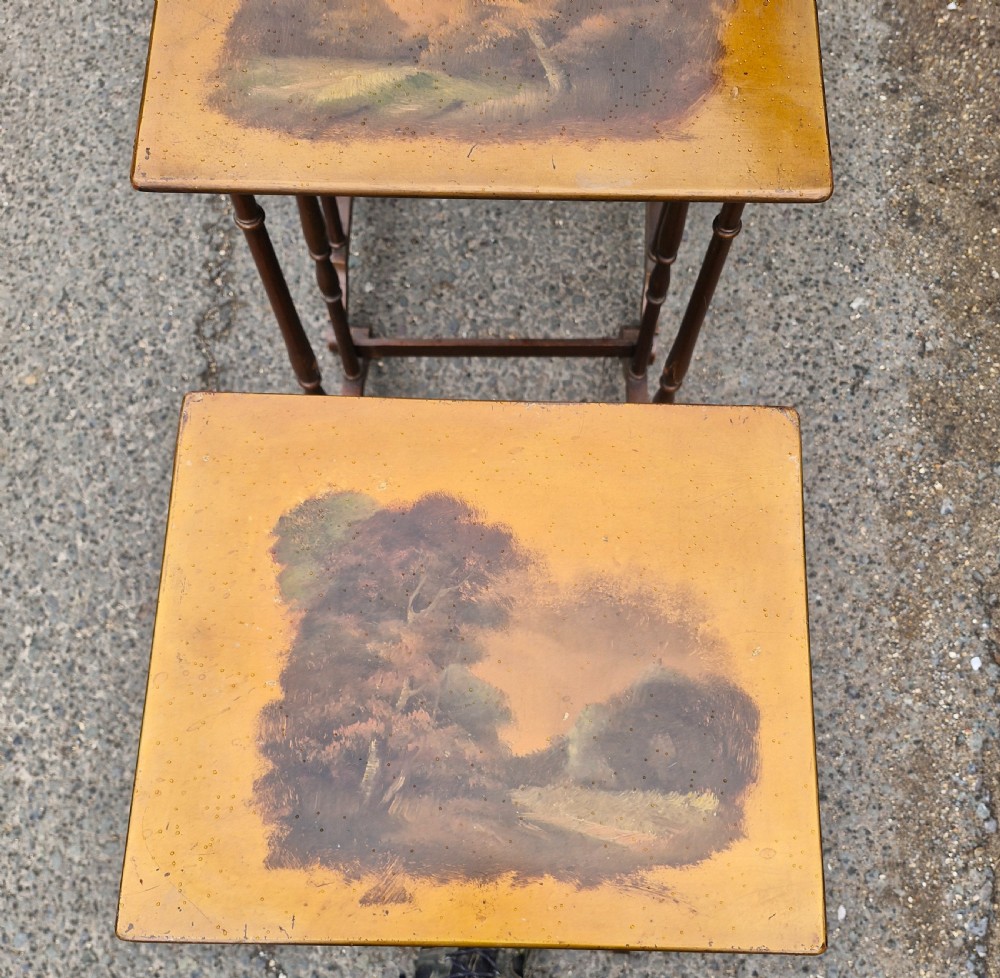 Nest of 4 early 20th century decorated occasional tables. View VIII