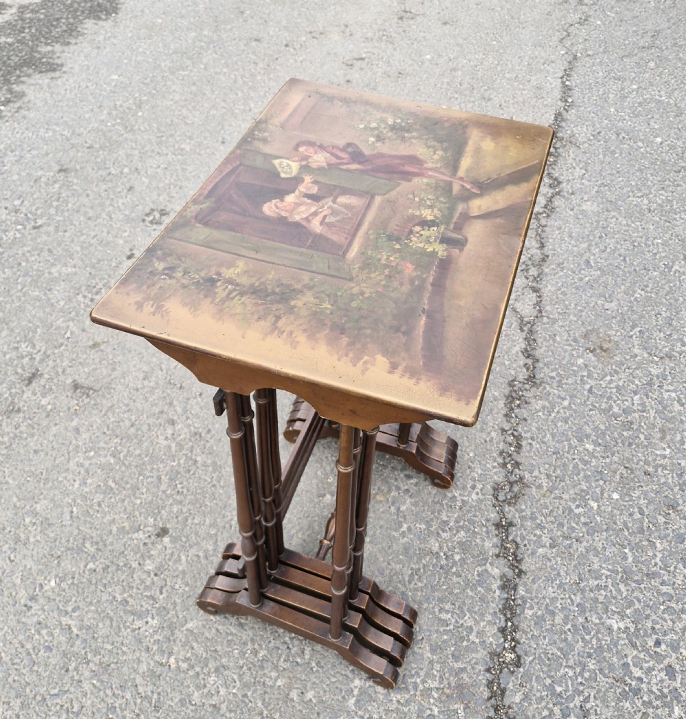 Nest of 4 early 20th century decorated occasional tables. View XVIII