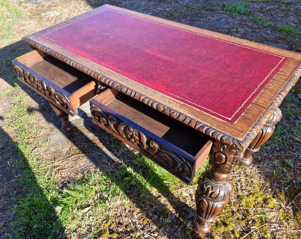 Victorian carved oak 2 drawer writing table.  View II