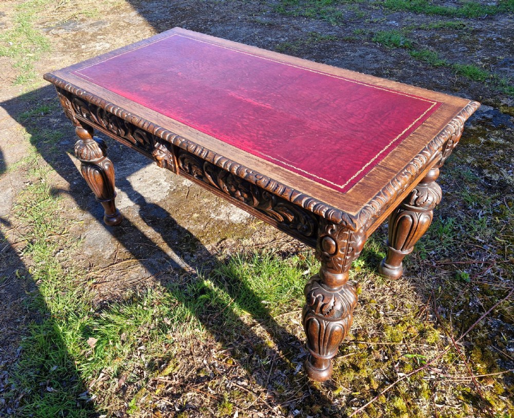 Victorian carved oak 2 drawer writing table.  View III