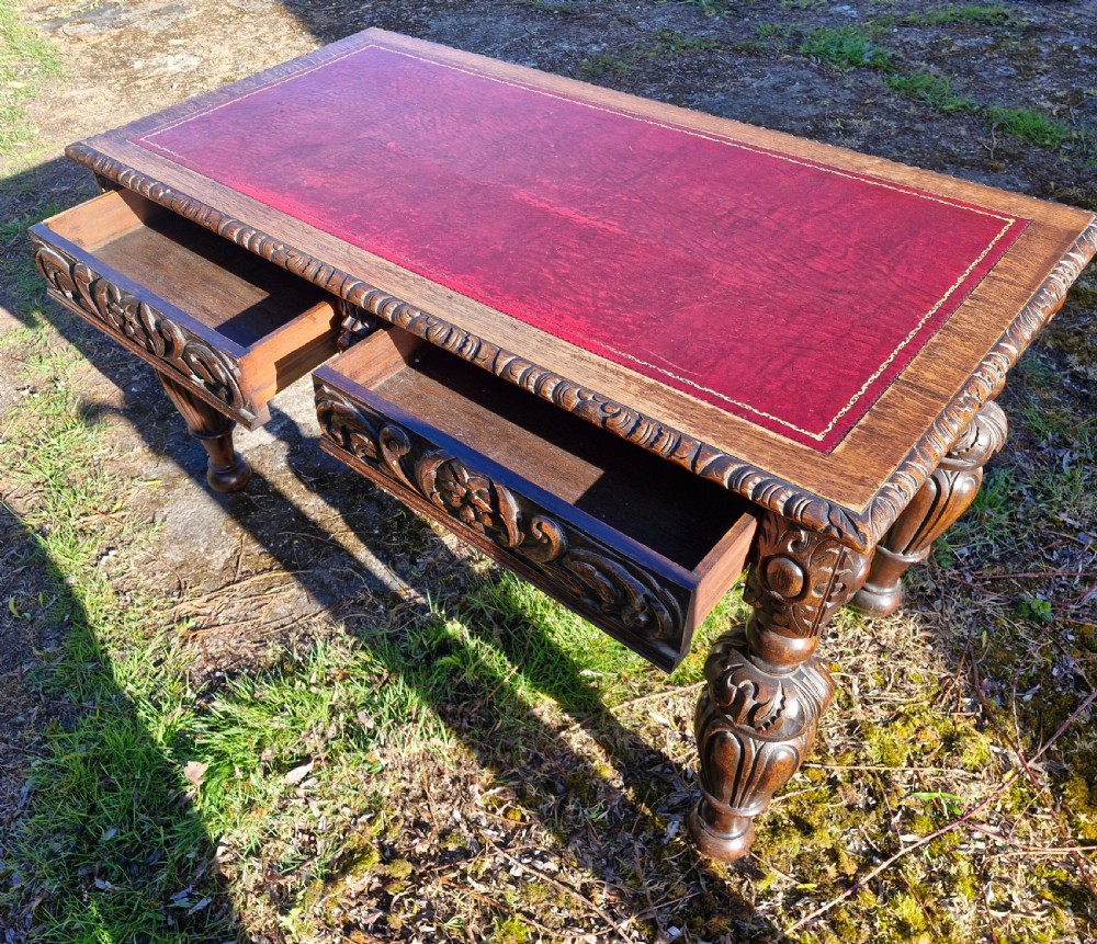 Victorian carved oak 2 drawer writing table.  View IV