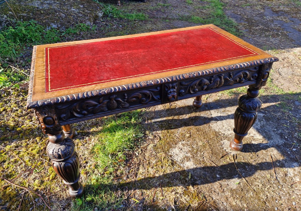 Victorian carved oak 2 drawer writing table.  View VI