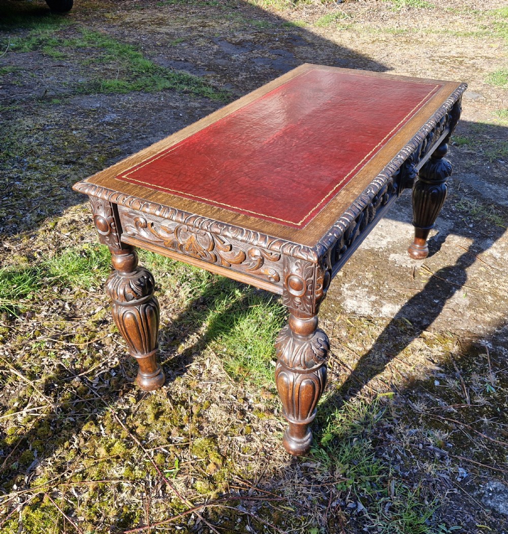 Victorian carved oak 2 drawer writing table.  View VII