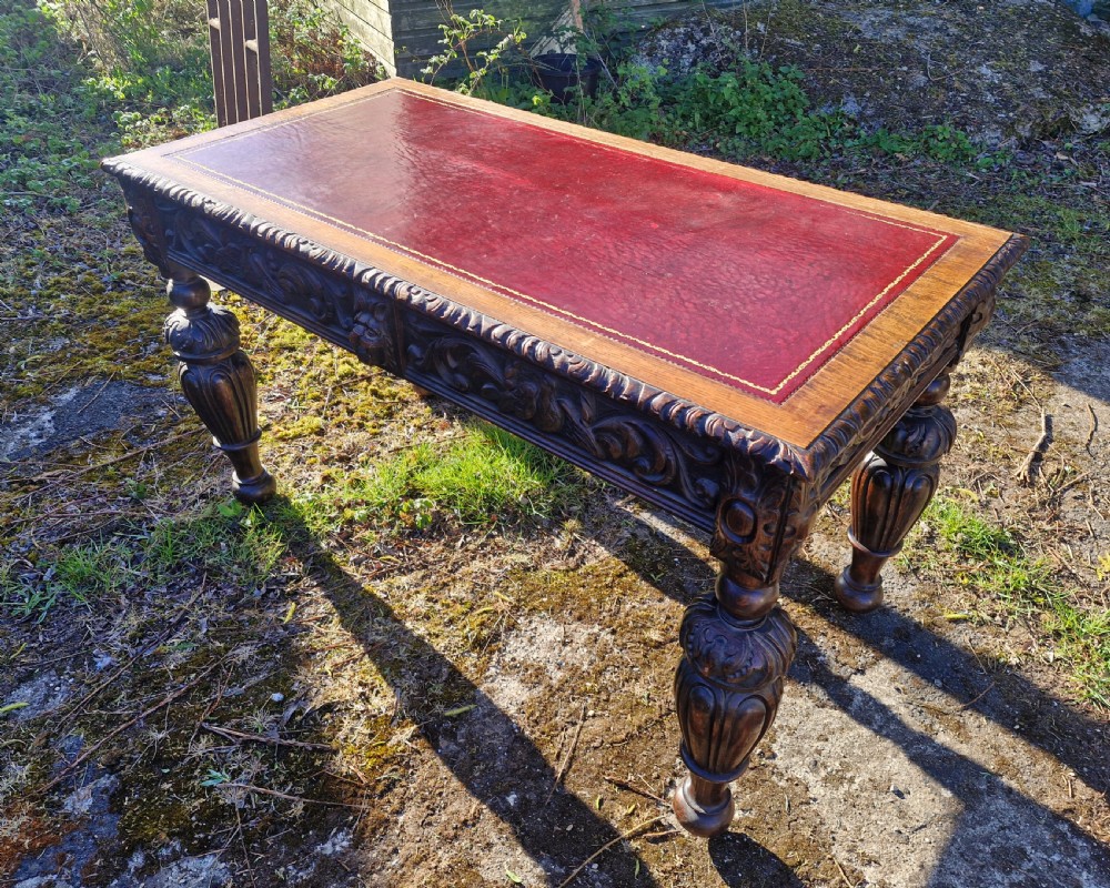Victorian carved oak 2 drawer writing table.  View VIII