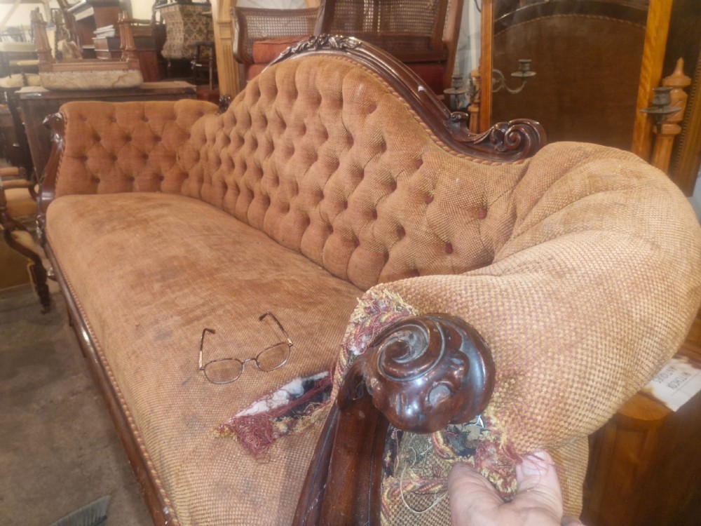 Large Victorian mahogany framed country house upholstered sofa. View VIII