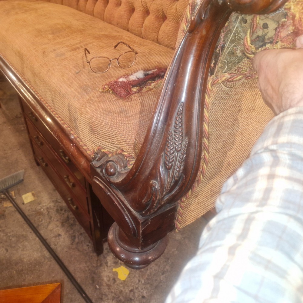 Large Victorian mahogany framed country house upholstered sofa. View IX