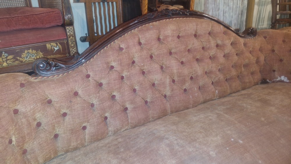 Large Victorian mahogany framed country house upholstered sofa. View XII