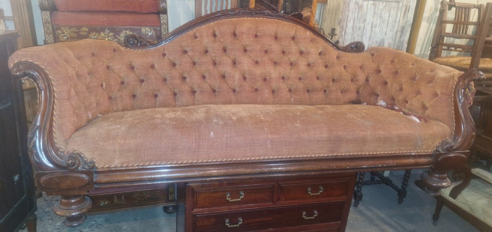 Large Victorian mahogany framed country house upholstered sofa. View XV