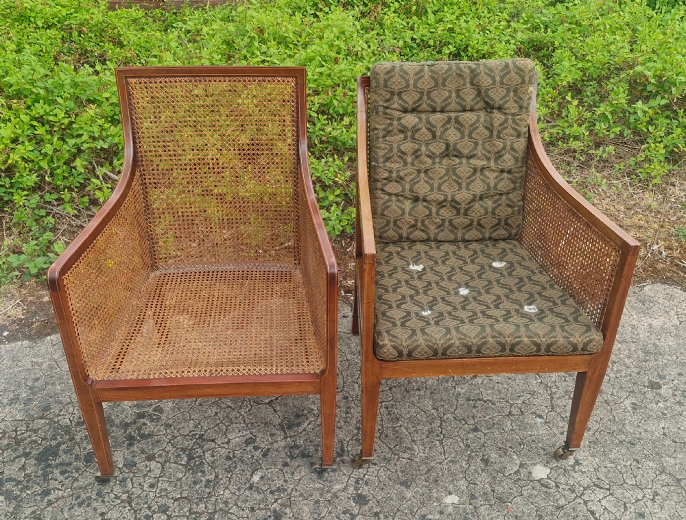 Matched pair of Edwardian inlaid mahogany Bergere armchairs. 