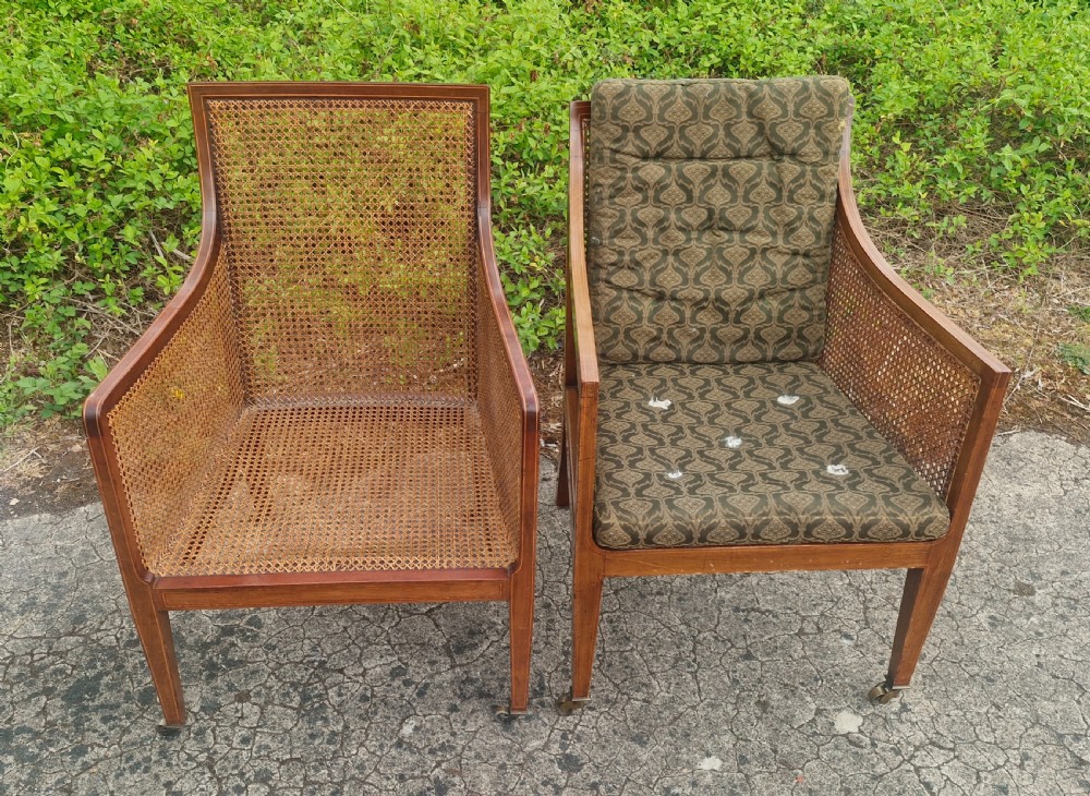 Matched pair of Edwardian inlaid mahogany Bergere armchairs.  View II