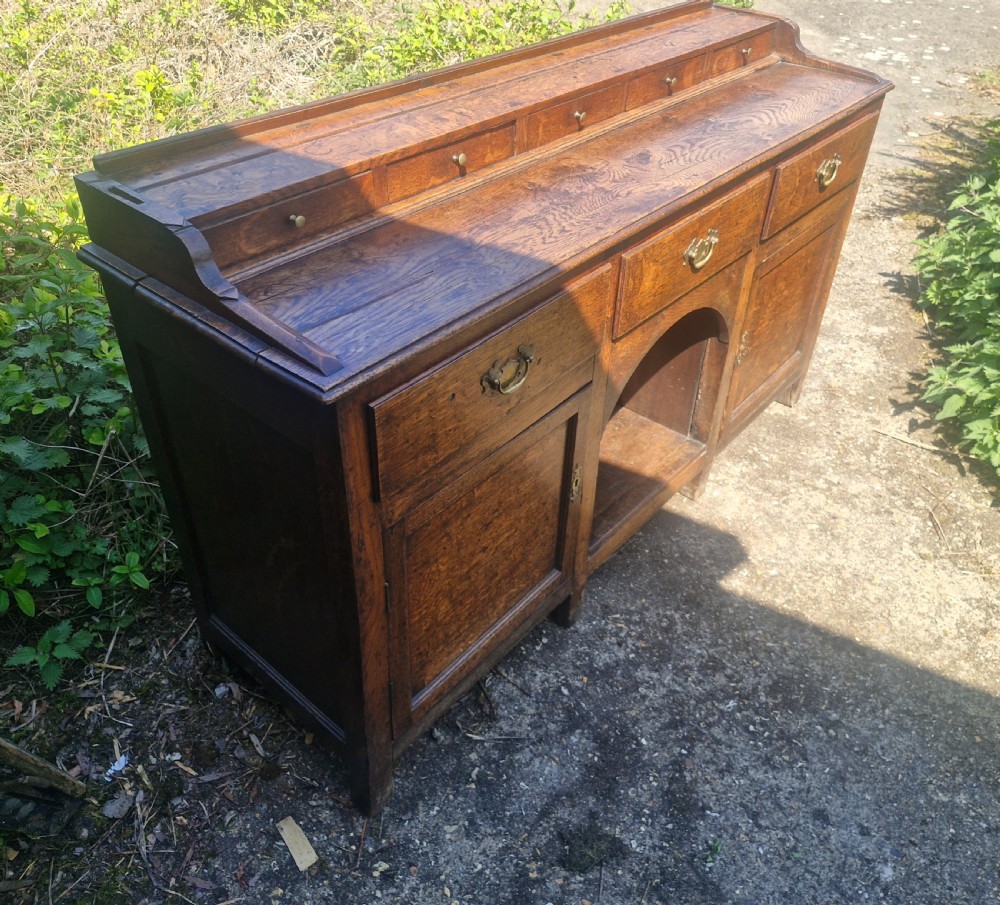 Late Georgian oak dog kennel dresser.  View IV