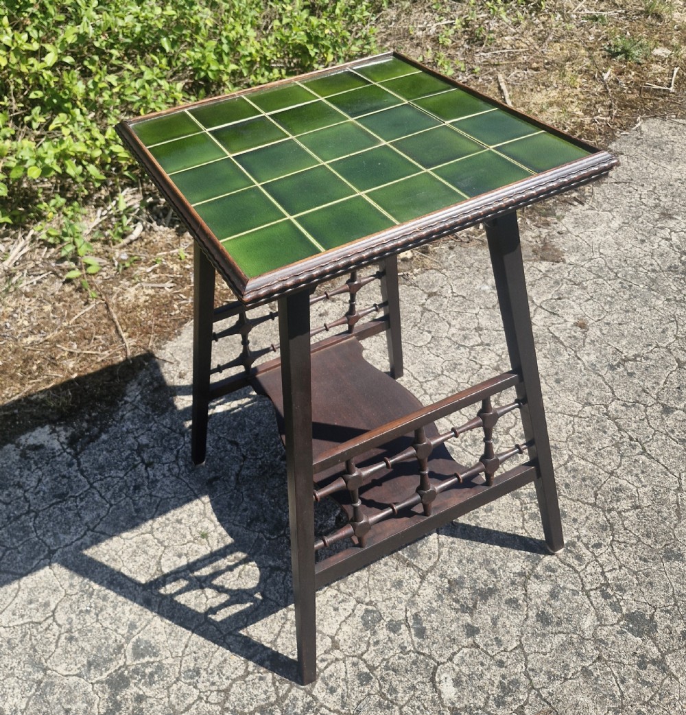 Late Victorian arts and crafts occasional table with makers number. 