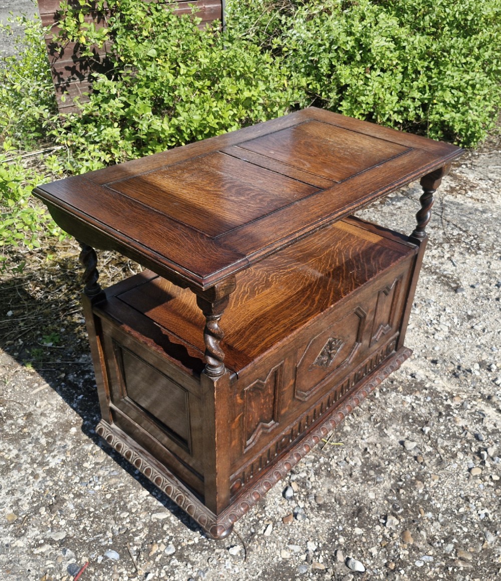 Edwardian oak monks bench.  View II